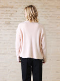 Elegant V-Neck Knit Sweater with Floral Brooch
