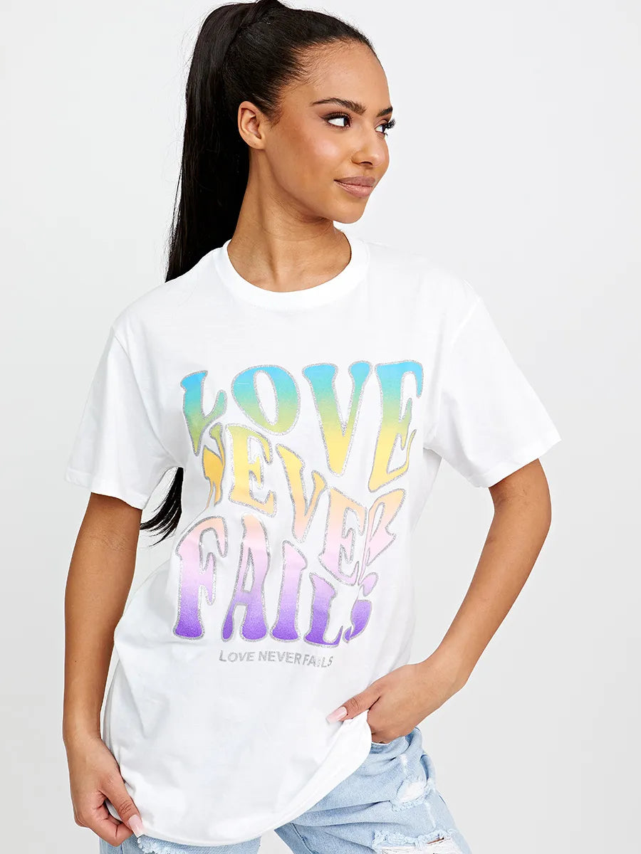  White Love Never Fails Graphic Printed Oversized T-Shirt 